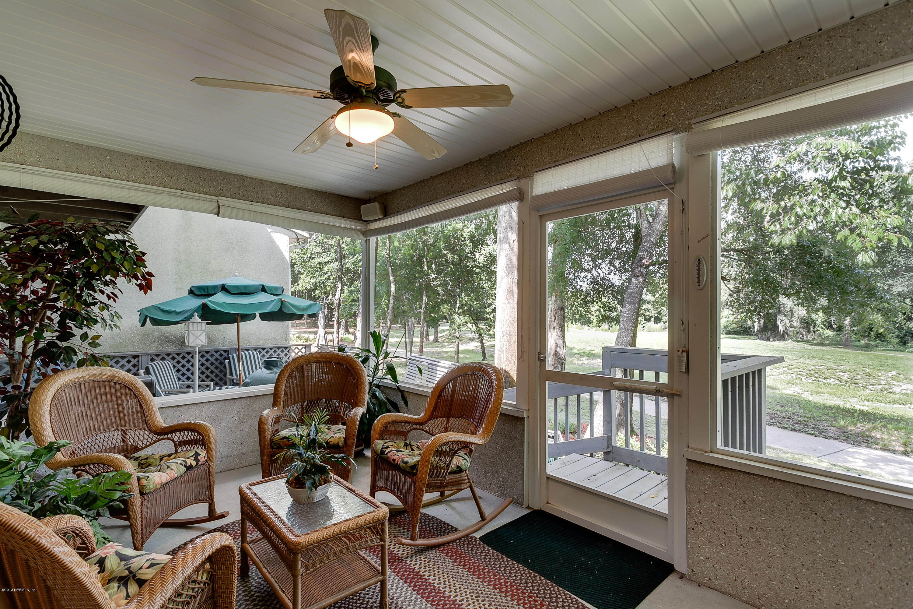 3105 Ravines Road Middleburg, FL 32068 - Photo 13 of 32 a living room with furniture and a large window