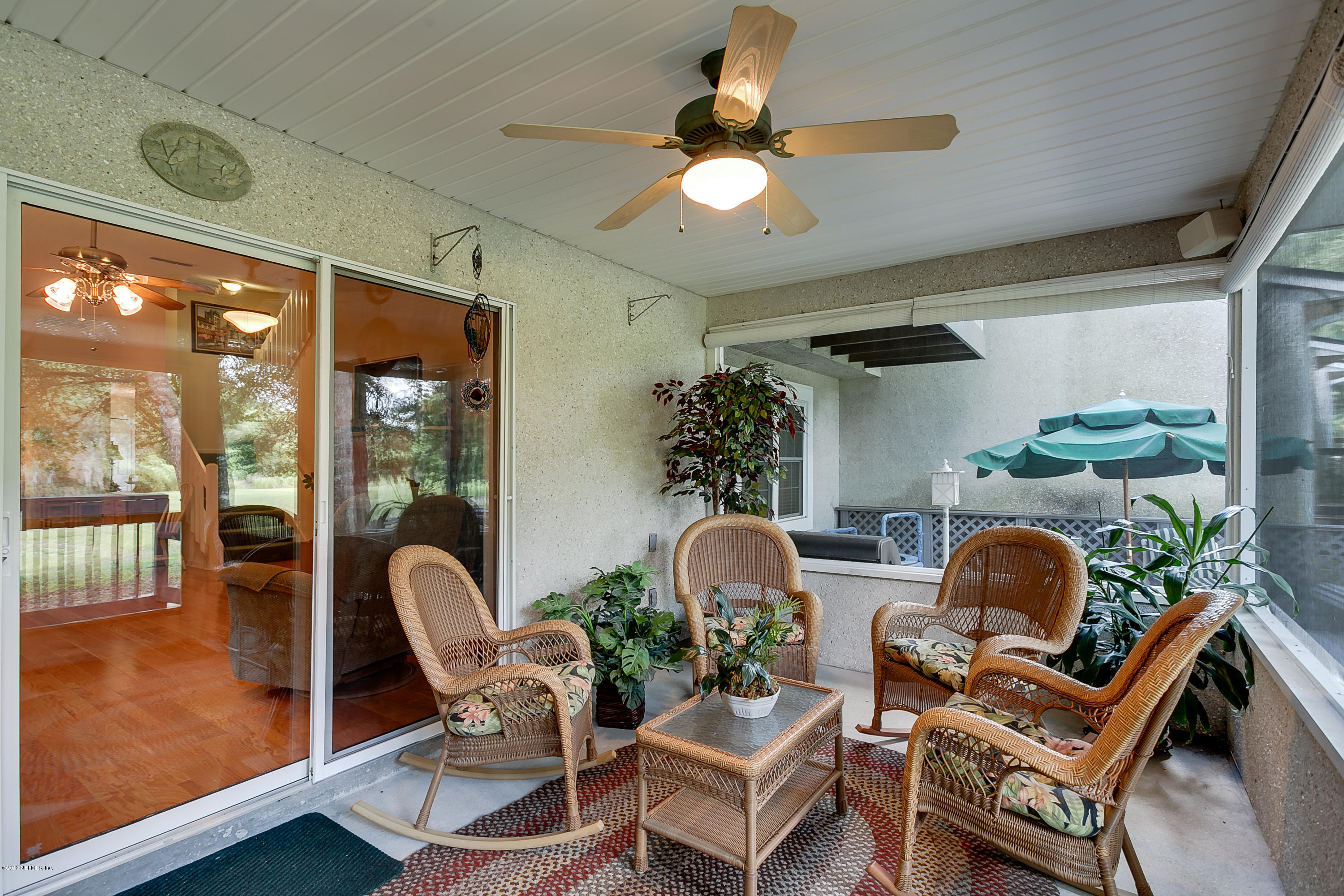 3105 Ravines Road Middleburg, FL 32068 - Photo 14 of 32 a living room with furniture and a large window