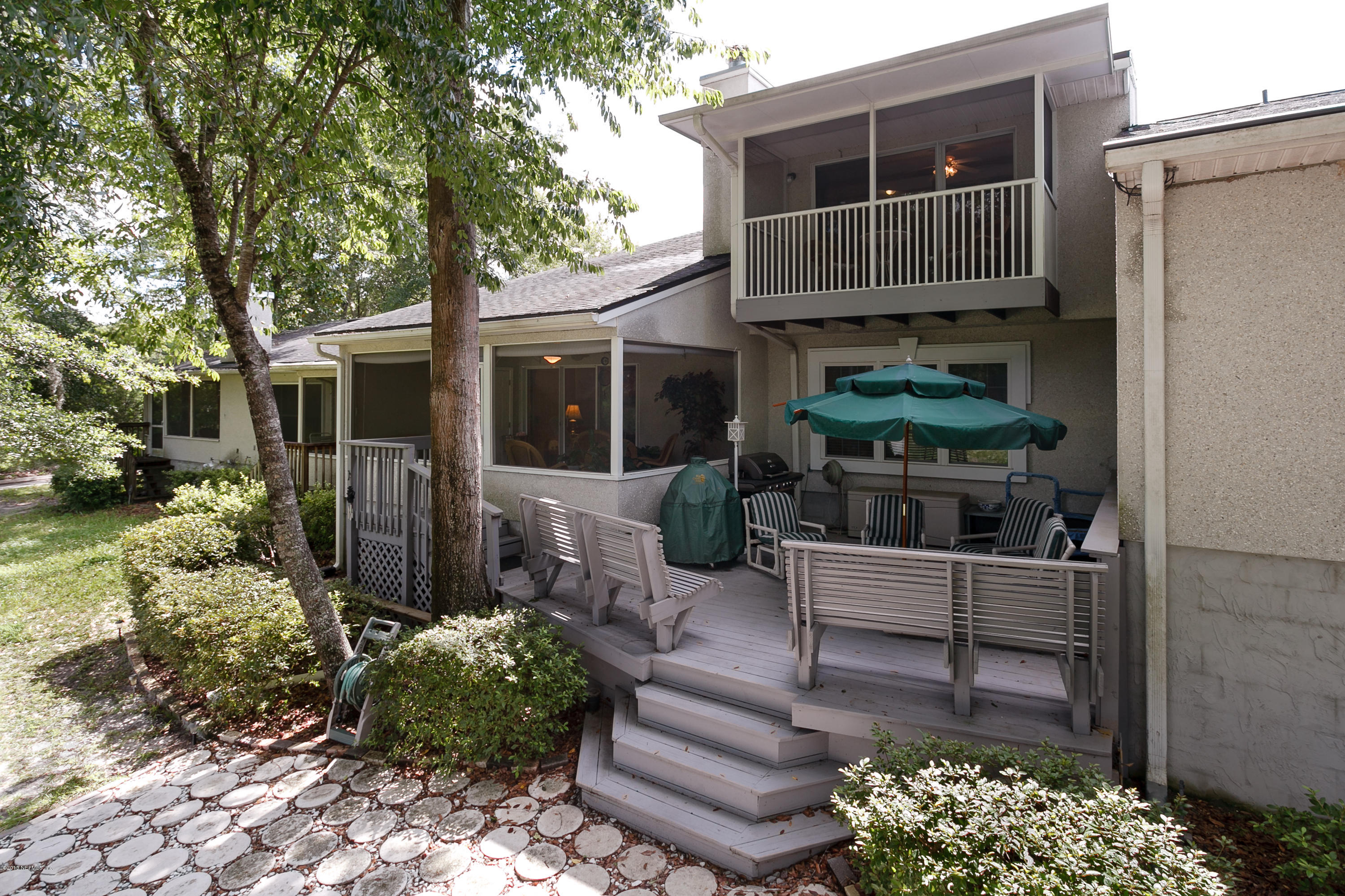 3105 Ravines Road Middleburg, FL 32068 - Photo 15 of 32 a view of house with a yard and sitting area