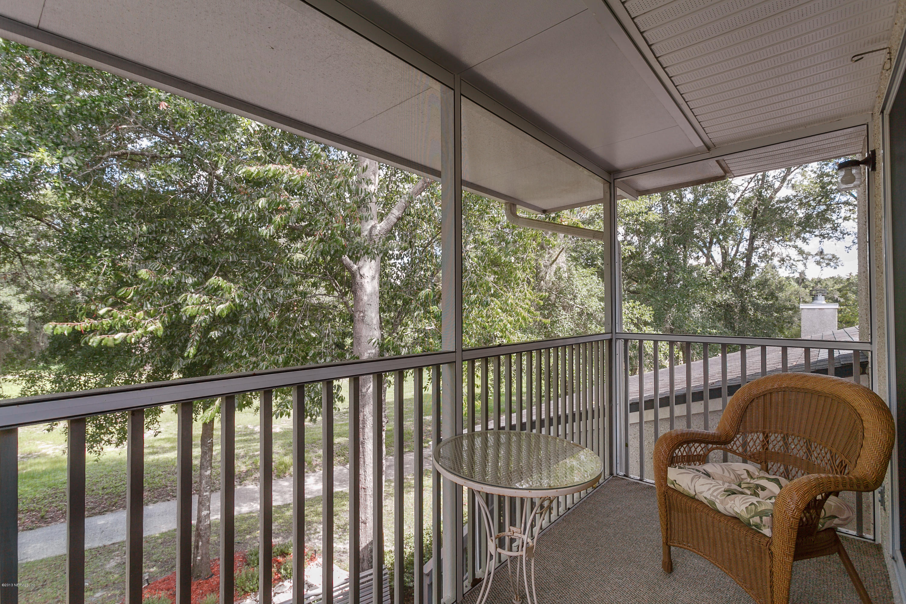 3105 Ravines Road Middleburg, FL 32068 - Photo 20 of 32 a view of a chair in a balcony