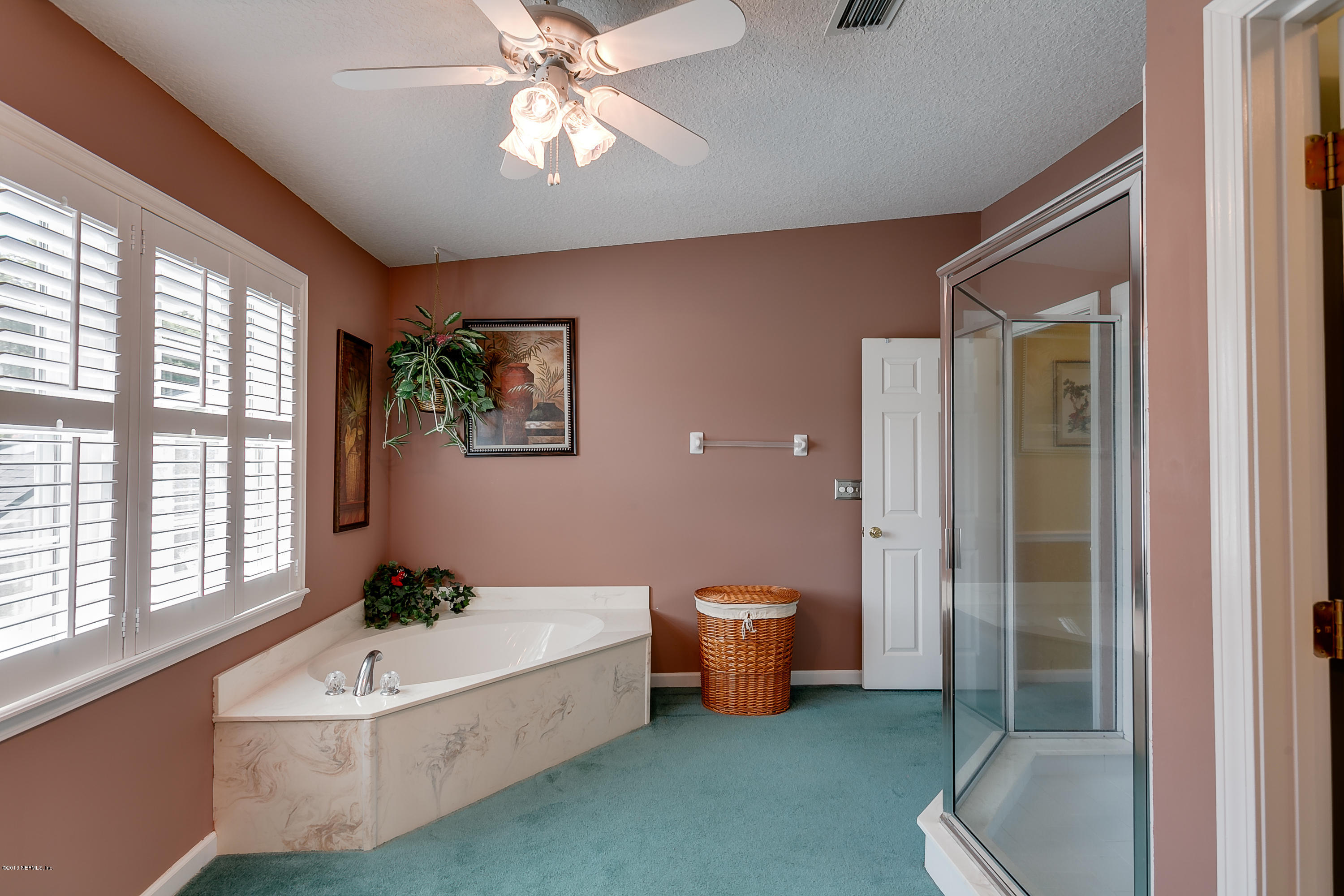 3105 Ravines Road Middleburg, FL 32068 - Photo 25 of 32 a living room with furniture and a large window