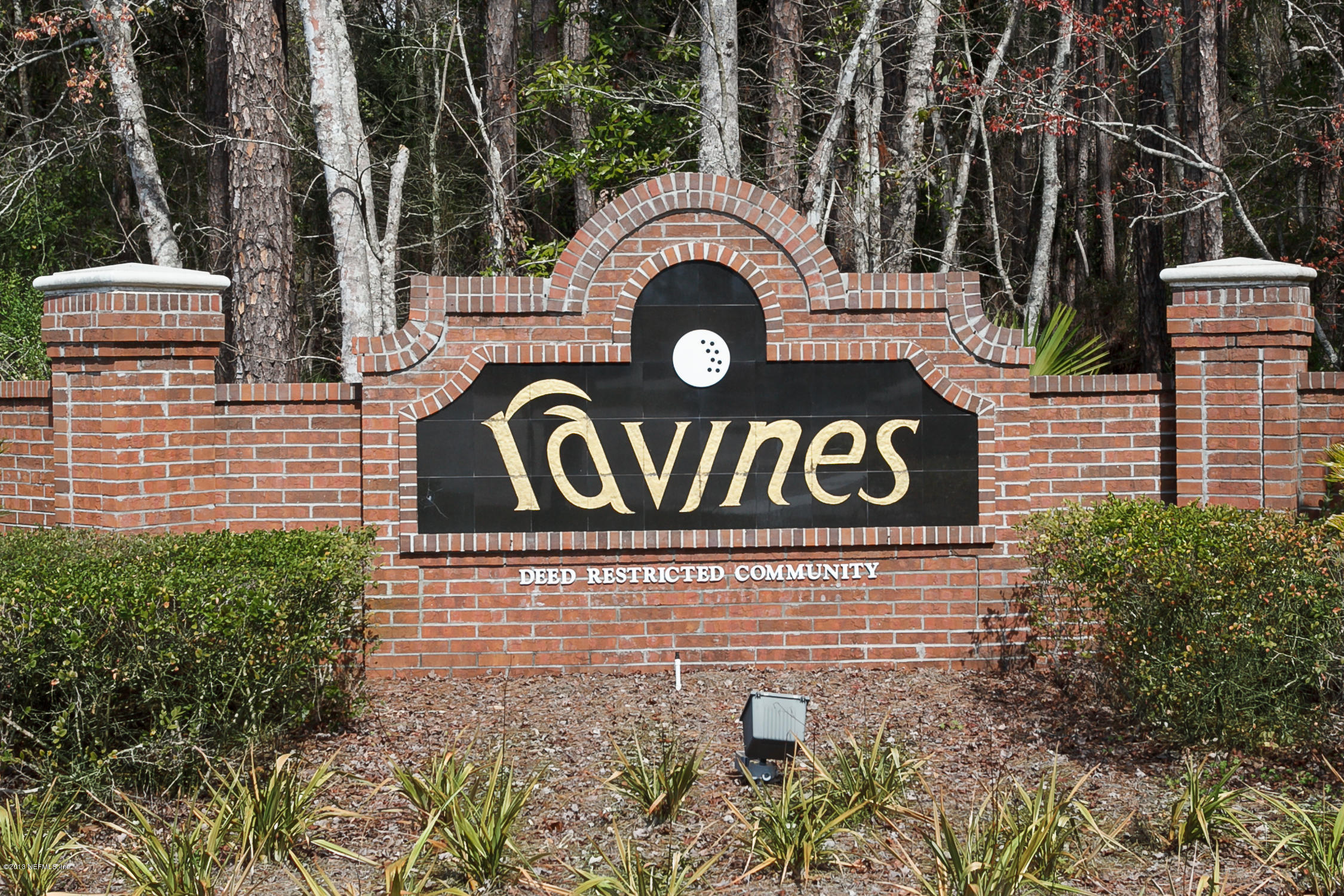 3105 Ravines Road Middleburg, FL 32068 - Photo 32 of 32 a sign that is on the side of a building
