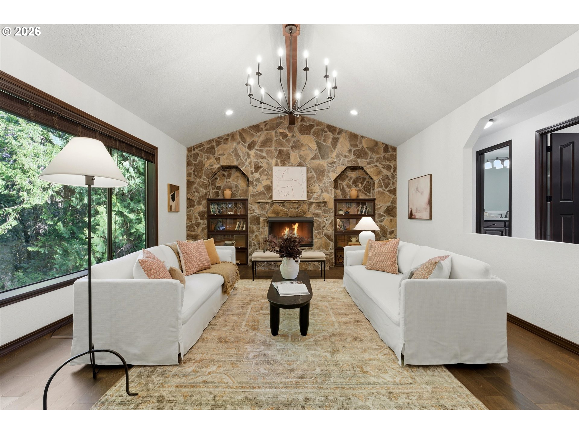 7236 Southeast 133rd Place Portland, OR 97236 - Photo 11 of 42 a living room with fireplace furniture and a large window