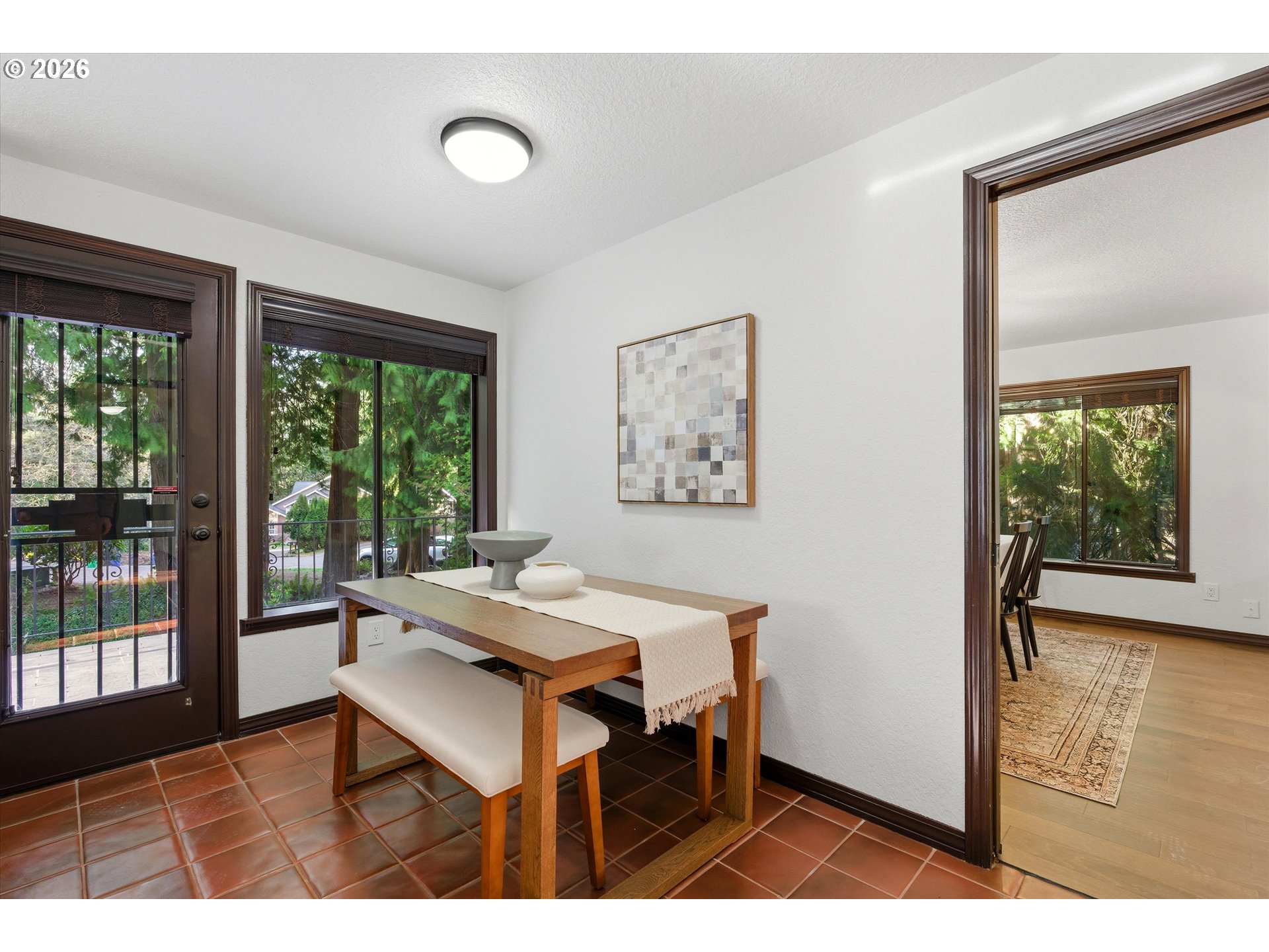 7236 Southeast 133rd Place Portland, OR 97236 - Photo 19 of 42 a view of a dining room with furniture and wooden floor