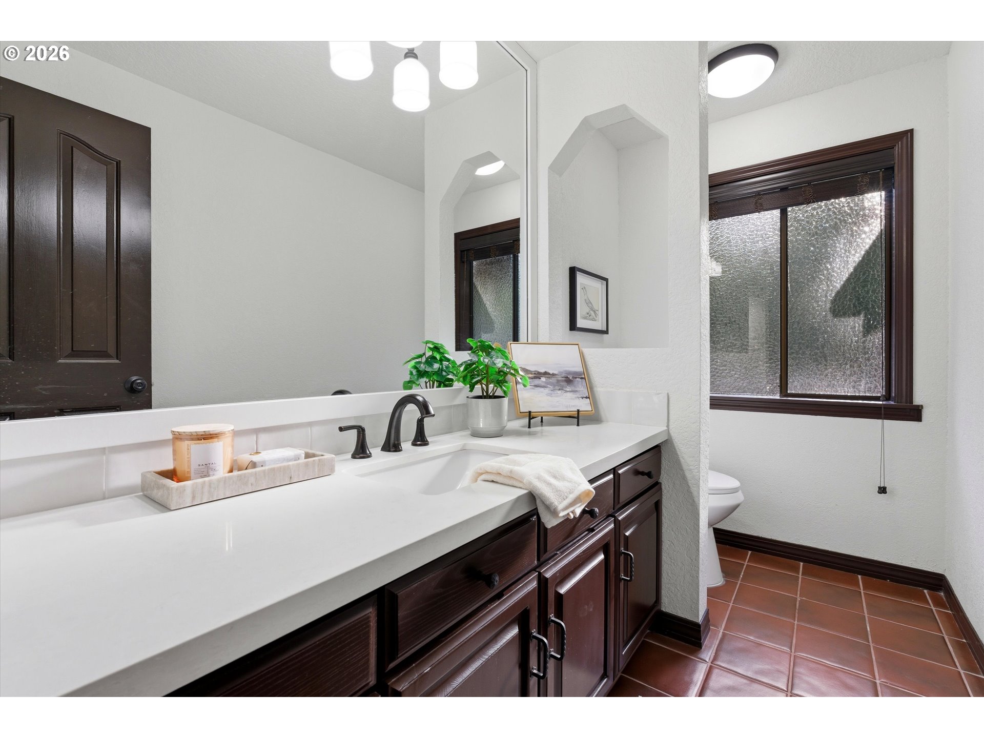 7236 Southeast 133rd Place Portland, OR 97236 - Photo 21 of 42 a bathroom with a sink and a mirror