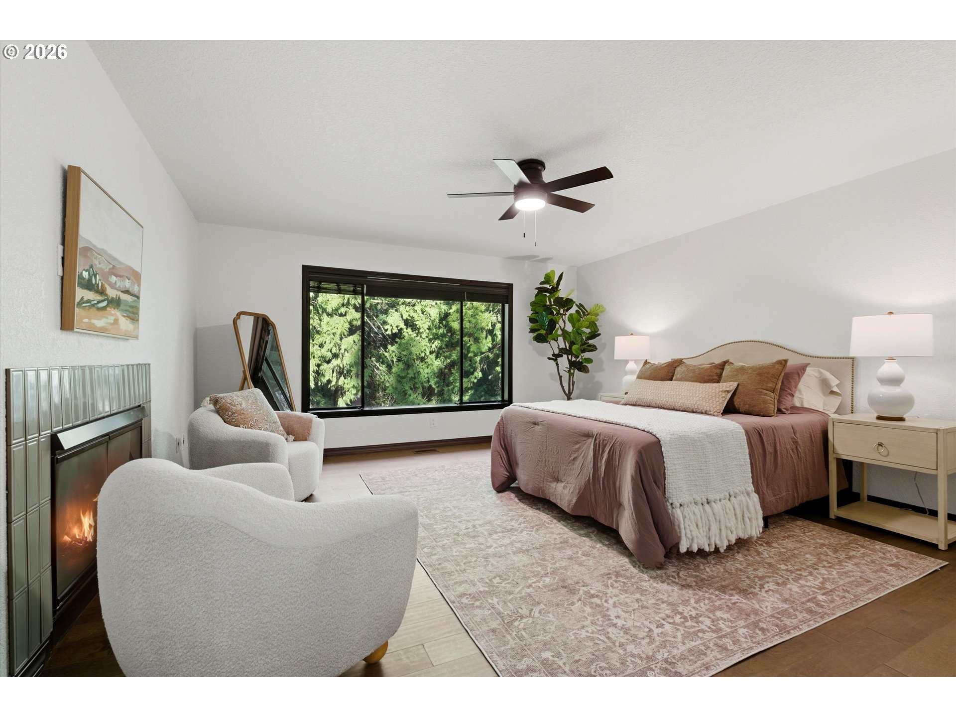 7236 Southeast 133rd Place Portland, OR 97236 - Photo 22 of 42 a bedroom with a large bed and a window