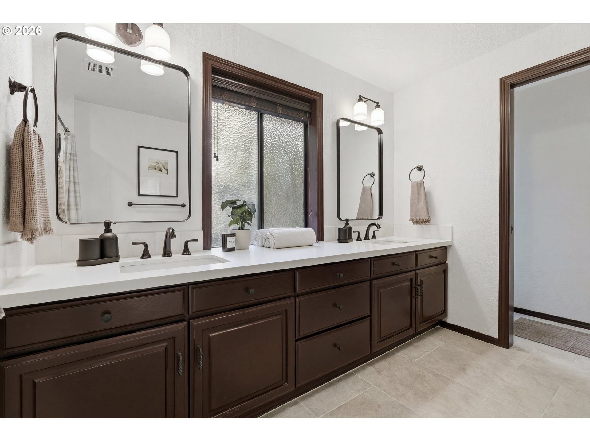 7236 Southeast 133rd Place Portland, OR 97236 - Photo 25 of 42 a bathroom with a double vanity sink and mirror