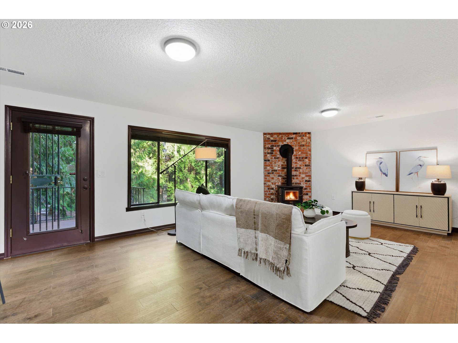 7236 Southeast 133rd Place Portland, OR 97236 - Photo 29 of 42 a living room with furniture and a window