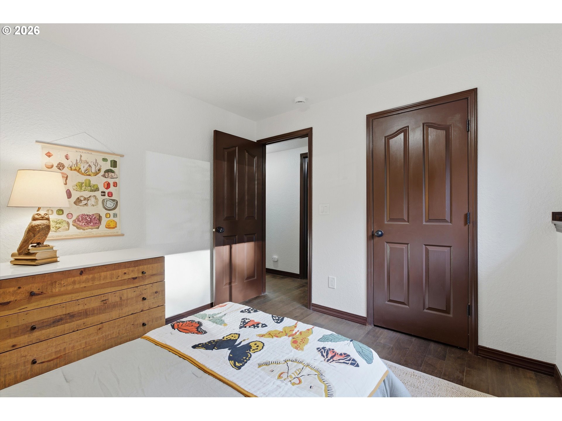 7236 Southeast 133rd Place Portland, OR 97236 - Photo 33 of 42 a bedroom with a bed and a dresser in it