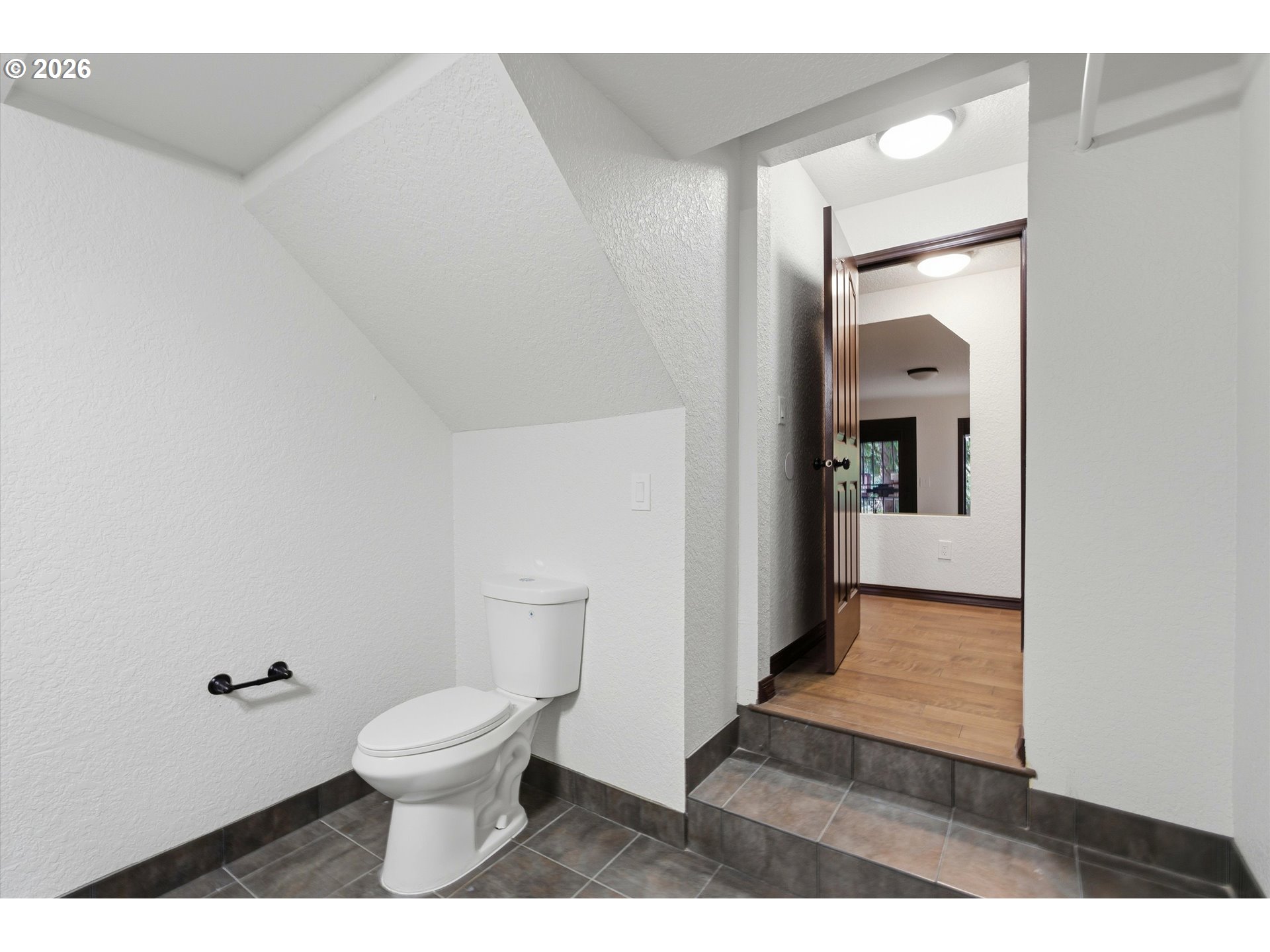 7236 Southeast 133rd Place Portland, OR 97236 - Photo 40 of 42 a bathroom with a toilet and a shower