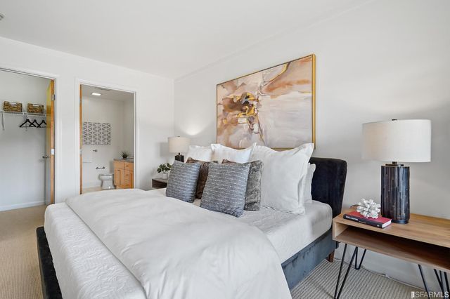 a terrace with outdoor seating city view and barbeque oven