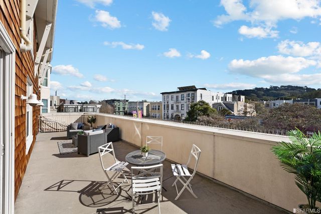 a bathroom with a glass door shower