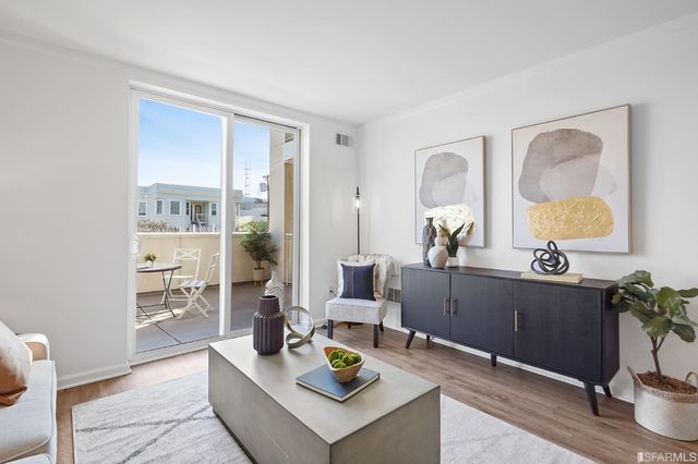 a bedroom with a bed and a table in it