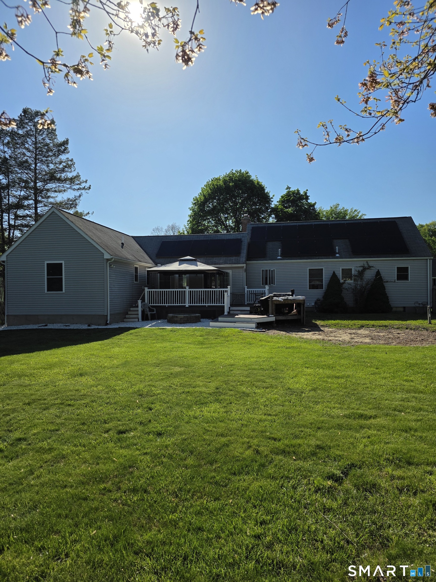 15 Van Buren Road Enfield, CT 06082 - Photo 5 of 40 a view of a house with a backyard