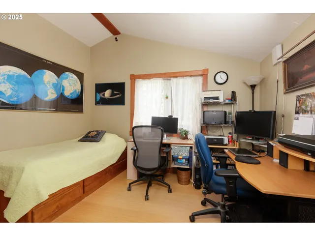 a view of a workspace with furniture