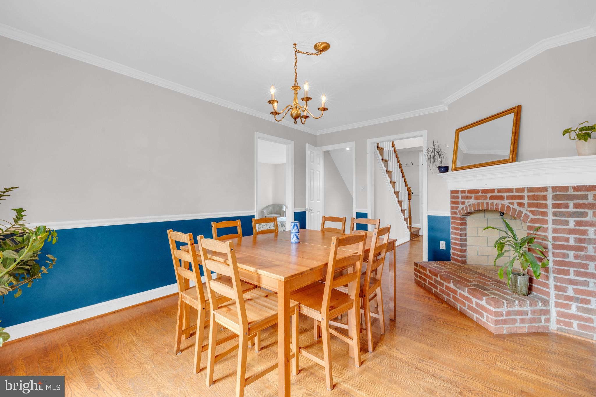 8729 Green Road Warrenton, VA 20187 - Photo 19 of 42 a view of a dining room with furniture and wooden floor
