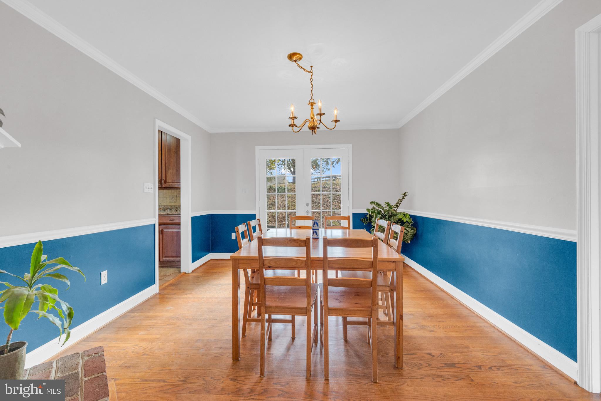 8729 Green Road Warrenton, VA 20187 - Photo 21 of 42 a view of a dining room with furniture window and wooden floor