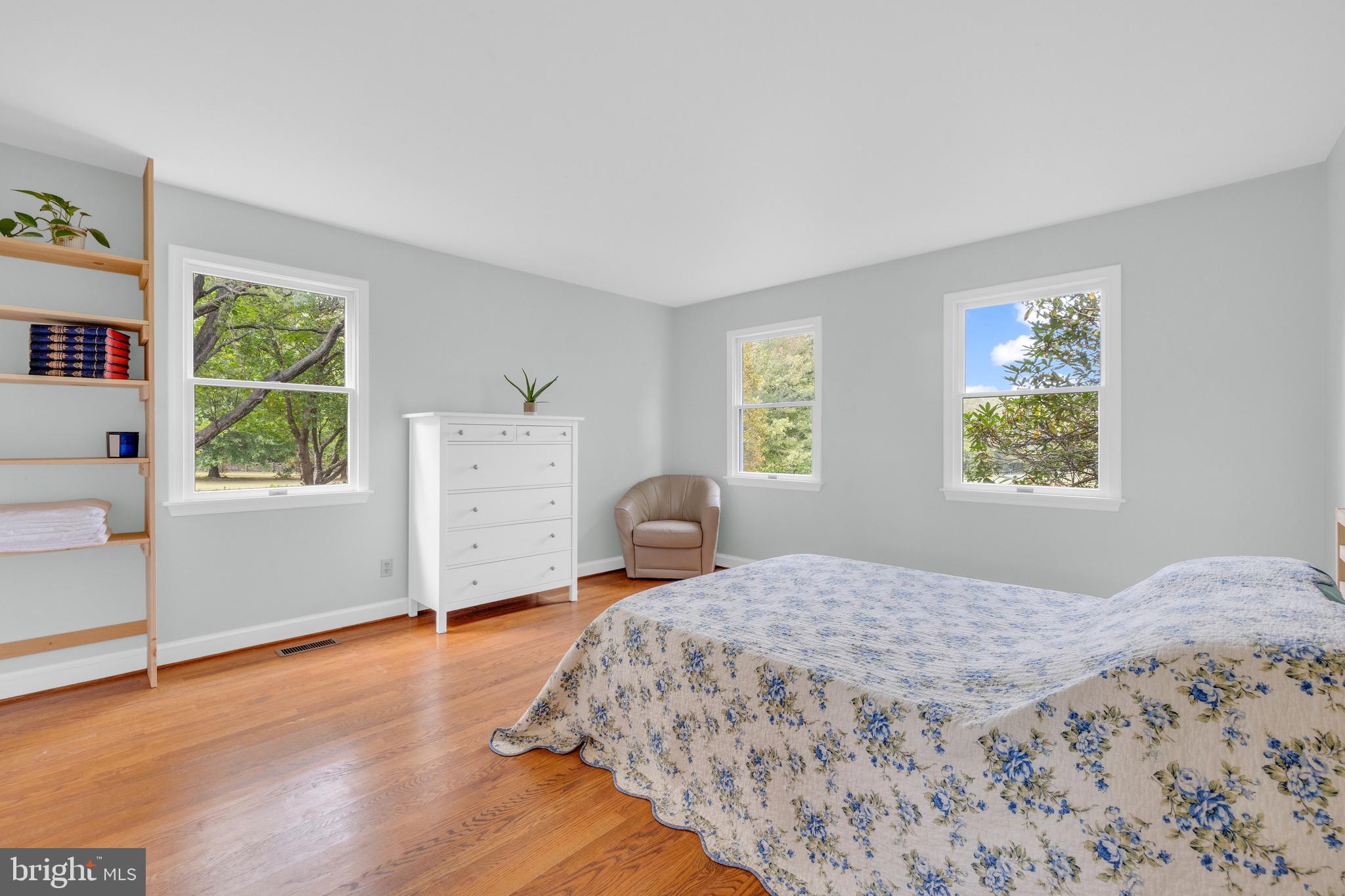 8729 Green Road Warrenton, VA 20187 - Photo 22 of 42 a bedroom with a bed and wooden floor