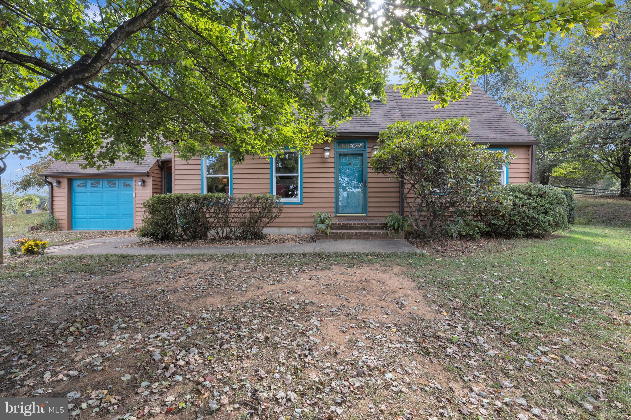 8729 Green Road Warrenton, VA 20187 - Photo 3 of 42 a view of a house with a yard and large tree