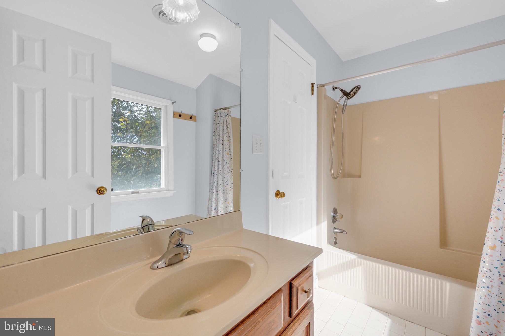 8729 Green Road Warrenton, VA 20187 - Photo 32 of 42 a bathroom with a sink and a mirror