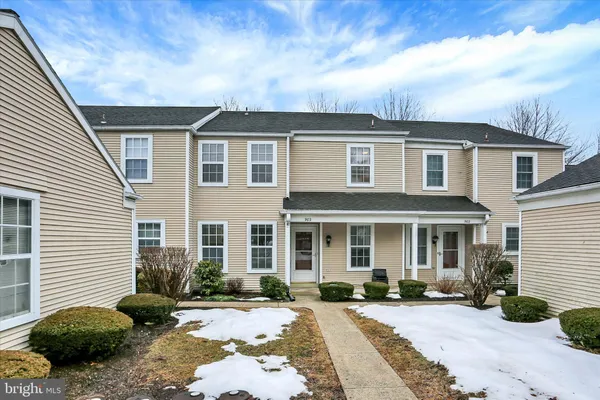 a front view of a house with a patio