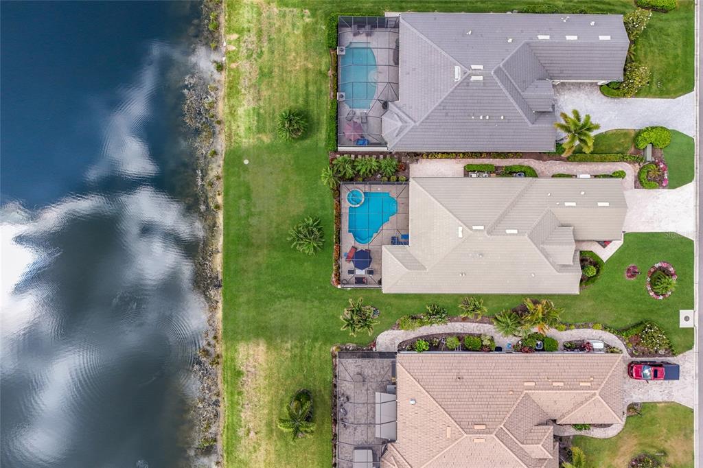 5011 Tobermory Way Bradenton, FL 34211 - Photo 39 of 77 an aerial view of a house with a yard