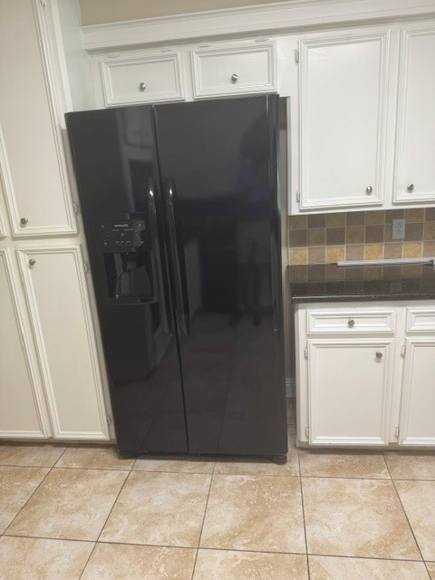 6026 Coral Ridge Road Houston, TX 77069 - Photo 11 of 34 Refrigerator with more granite countertops.