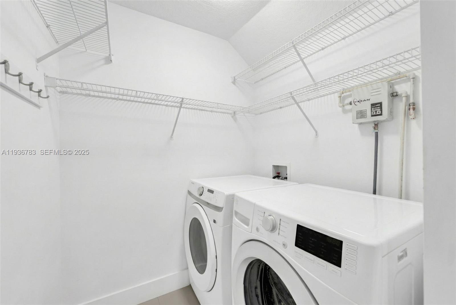 3725 Southwest 153rd Court Miami, FL 33185 - Photo 10 of 22 a utility room with dryer and washer