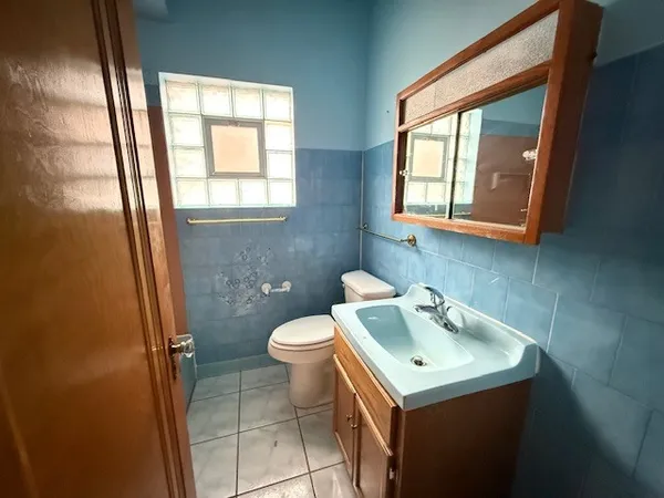 a bathroom with a sink and a toilet