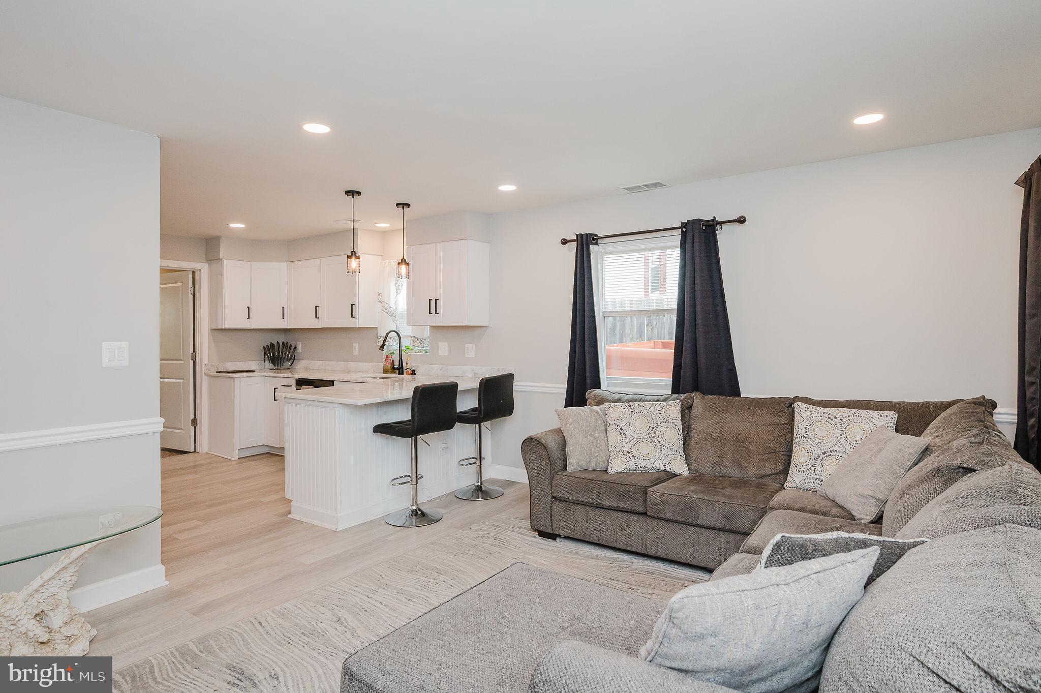 4 Right Aileron Baltimore, MD 21220 - Photo 4 of 30 a living room with furniture and a large window