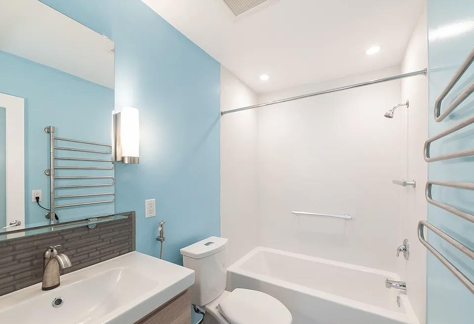 4927 Indian Wood Road Culver City, CA 90230 - Photo 5 of 20 a bathroom with a sink toilet and shower