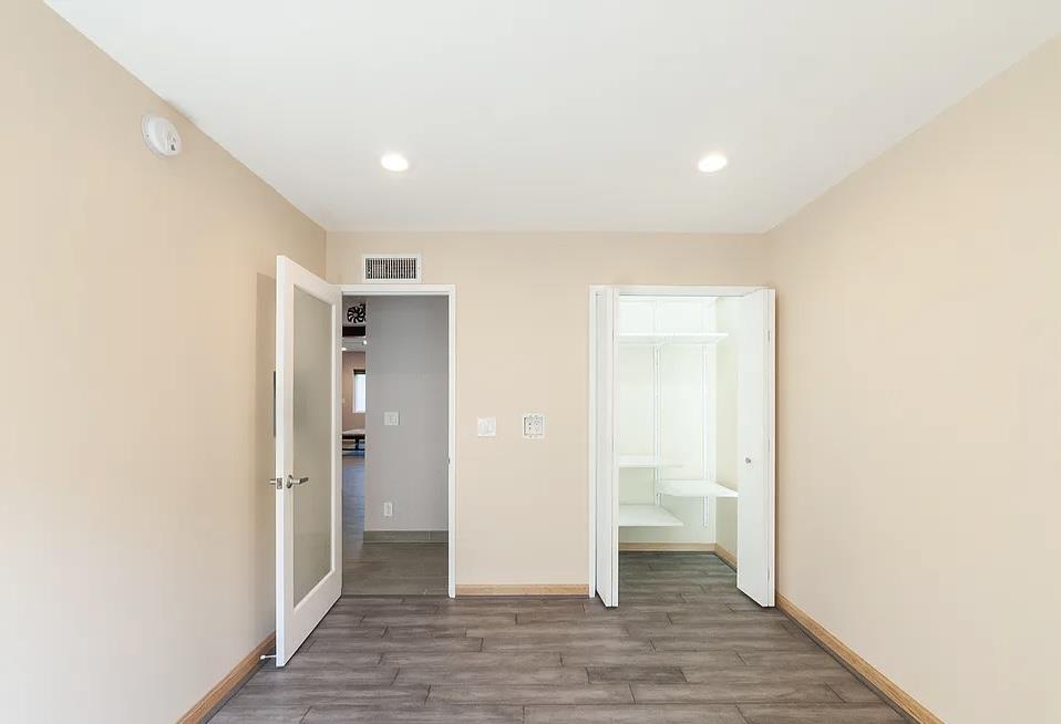 4927 Indian Wood Road Culver City, CA 90230 - Photo 9 of 20 a view of a hallway with wooden floor