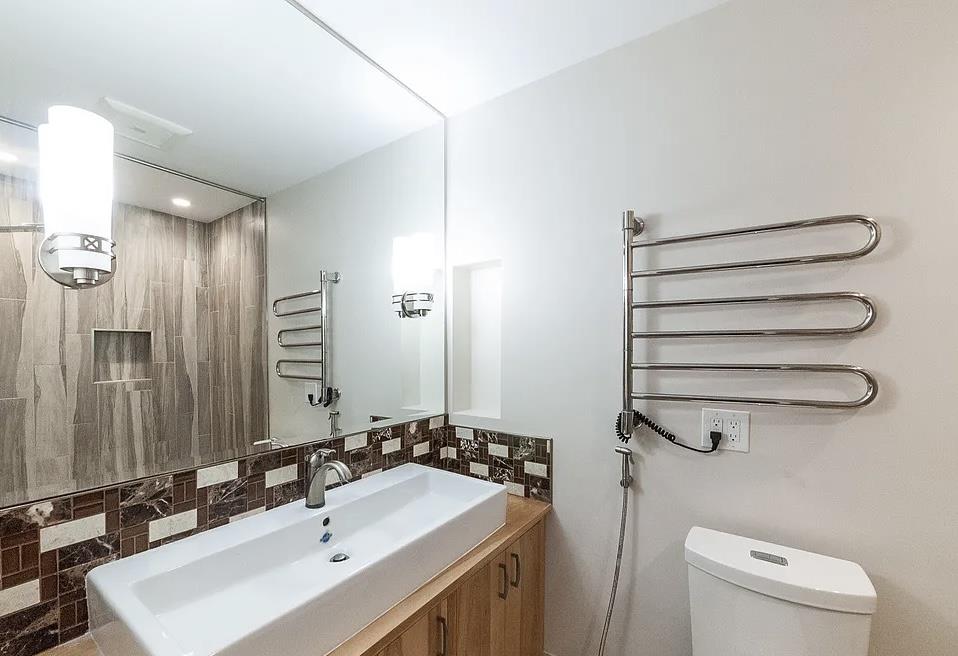 4927 Indian Wood Road Culver City, CA 90230 - Photo 10 of 20 a bathroom with a sink a toilet and shower