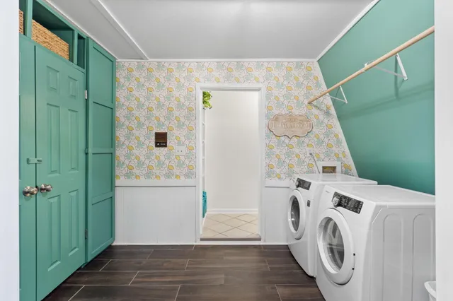 a utility room with dryer and washer