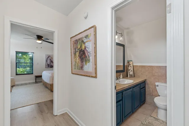 a spacious bedroom with a bed and a couch