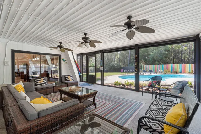 a house view with a sitting space and garden space