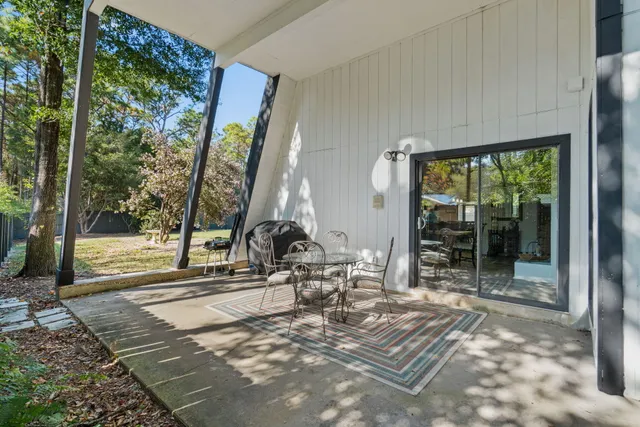 a view of a yard with a bench