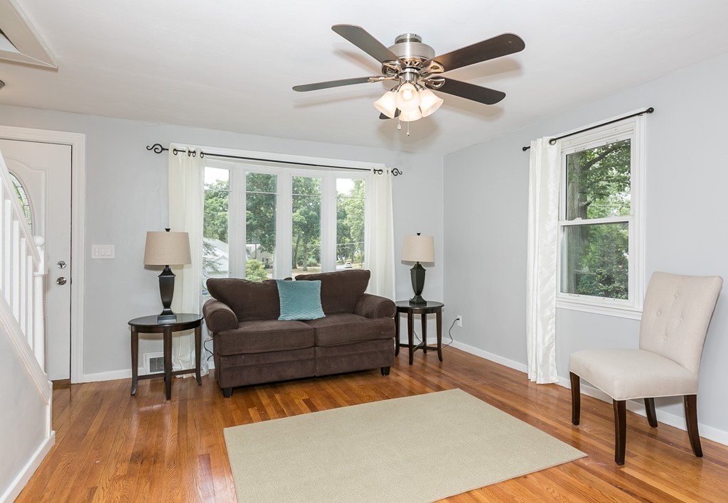 219 Cooper Street Springfield, MA 01108 - Photo 11 of 29 a living room with furniture and a large window