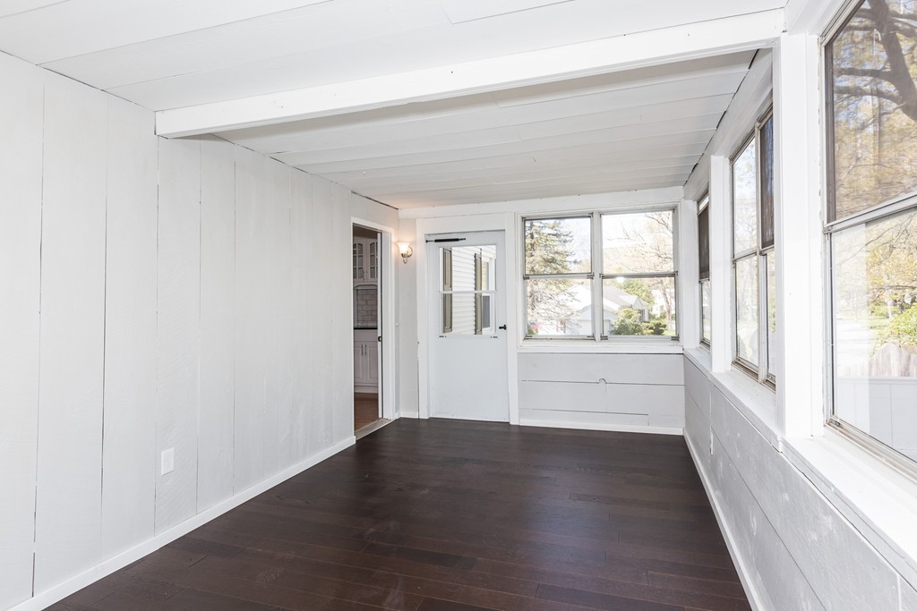 219 Cooper Street Springfield, MA 01108 - Photo 12 of 29 an empty room with wooden floor and windows