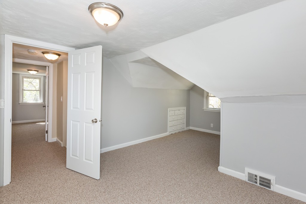 219 Cooper Street Springfield, MA 01108 - Photo 20 of 29 a view of an empty room and window