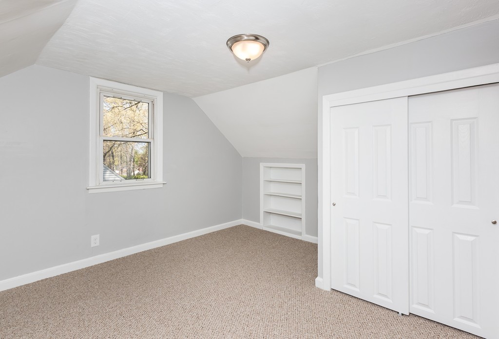 219 Cooper Street Springfield, MA 01108 - Photo 21 of 29 an empty room with windows and closet