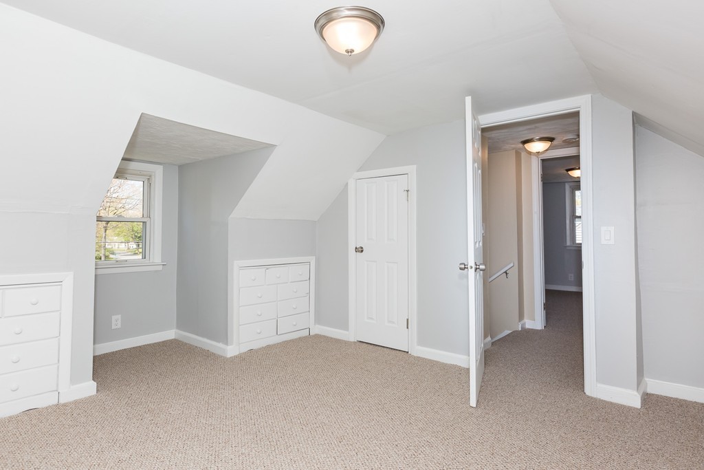 219 Cooper Street Springfield, MA 01108 - Photo 23 of 29 an empty room with windows and closet
