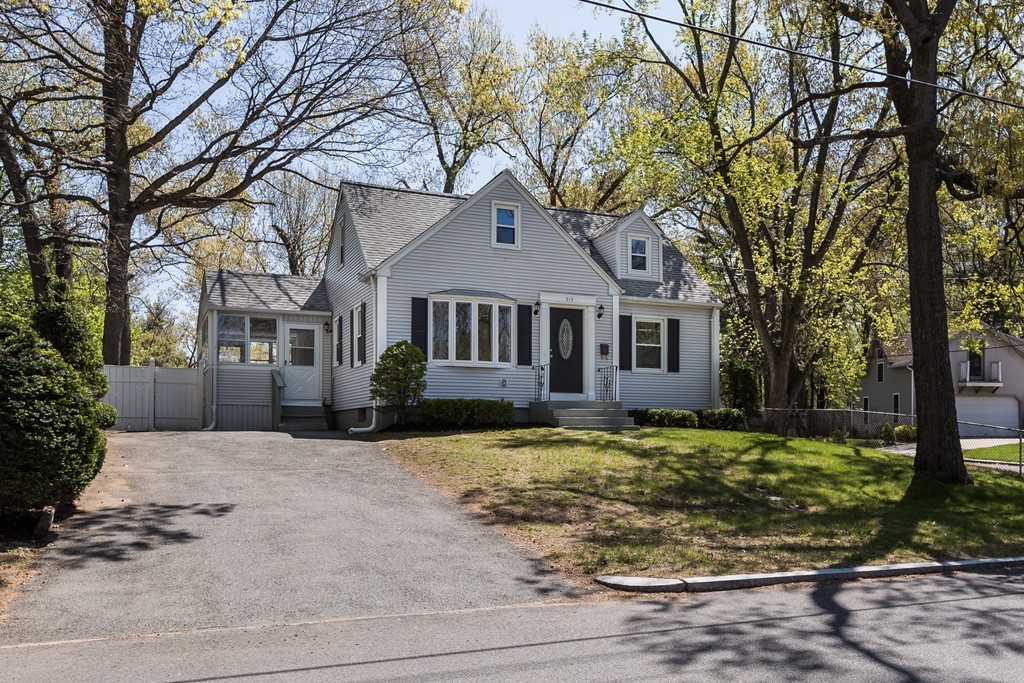 219 Cooper Street Springfield, MA 01108 - Photo 24 of 29 a front view of a house with a yard