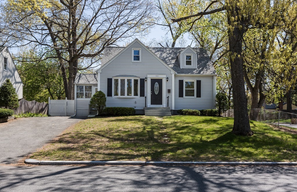 219 Cooper Street Springfield, MA 01108 - Photo 25 of 29 a front view of a house with a yard