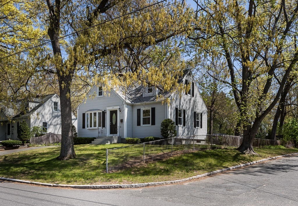 219 Cooper Street Springfield, MA 01108 - Photo 26 of 29 a front view of house with yard and green space