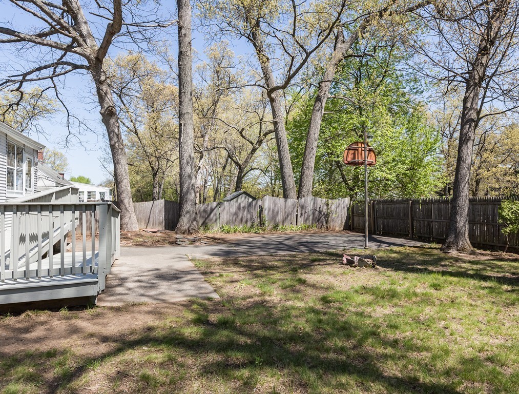 219 Cooper Street Springfield, MA 01108 - Photo 29 of 29 a backyard of a house with barbeque oven