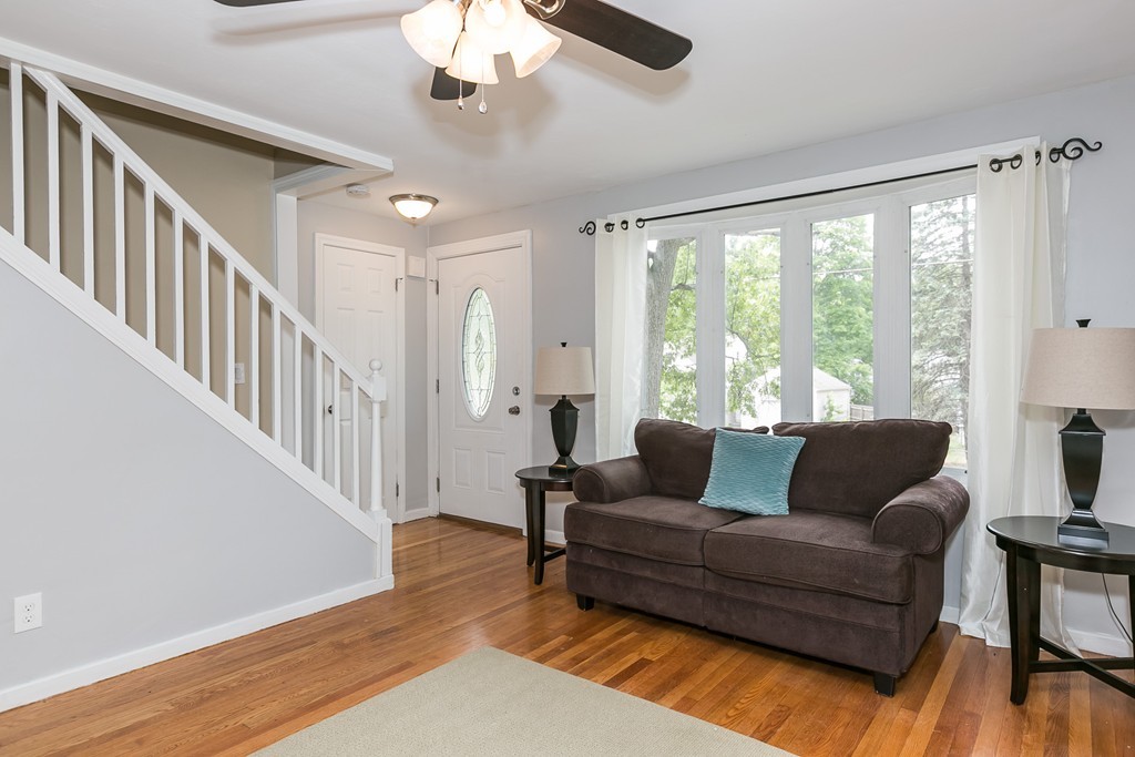 219 Cooper Street Springfield, MA 01108 - Photo 8 of 29 a living room with furniture and a large window