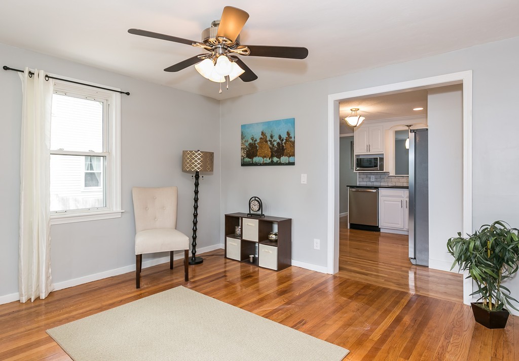 219 Cooper Street Springfield, MA 01108 - Photo 10 of 29 a living room with furniture and a table