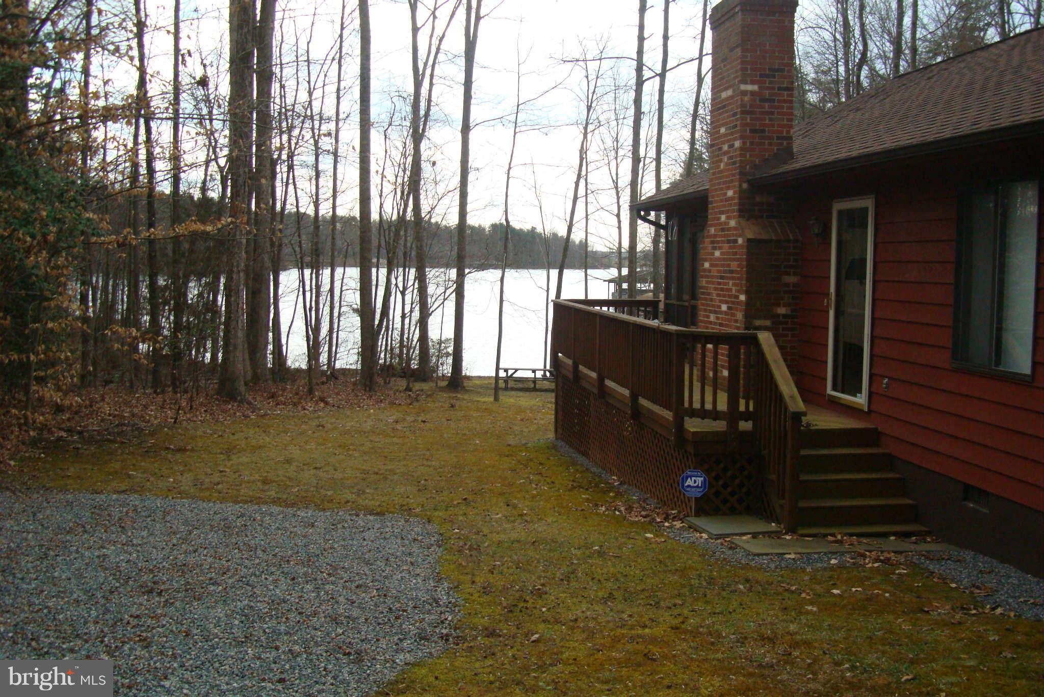 2 Wallers Quarters Road Bumpass, VA 23024 - Photo 5 of 13 a view of outdoor space with deck and living room