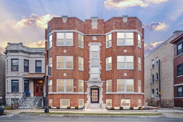 1416 West Foster Avenue, Unit 2W Chicago, IL 60640 - Photo 1 of 1 a front view of a multi story building